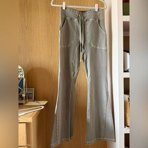 Free People Olive Green Flared Leggings with Contrast Stitching